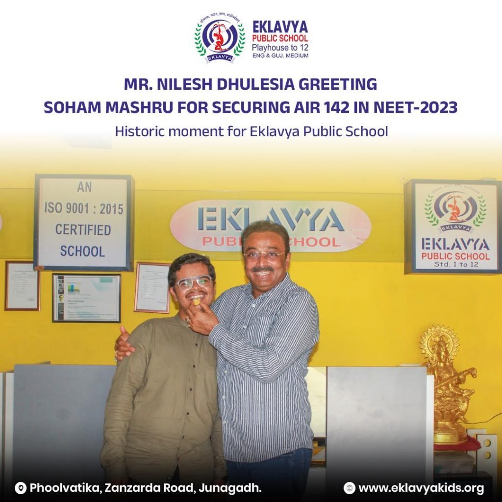 Mr. Nilesh Dhulesia, Founder of Eklavya Group of Schools greeting Soham Mashru for securing All India Rank 142 in NEET 2023.